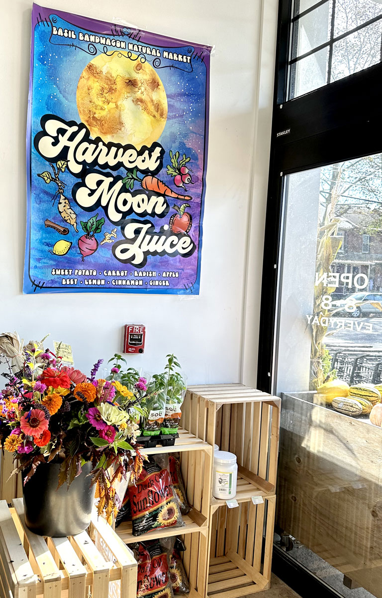 Harvest Moon Juice poster in store foyer